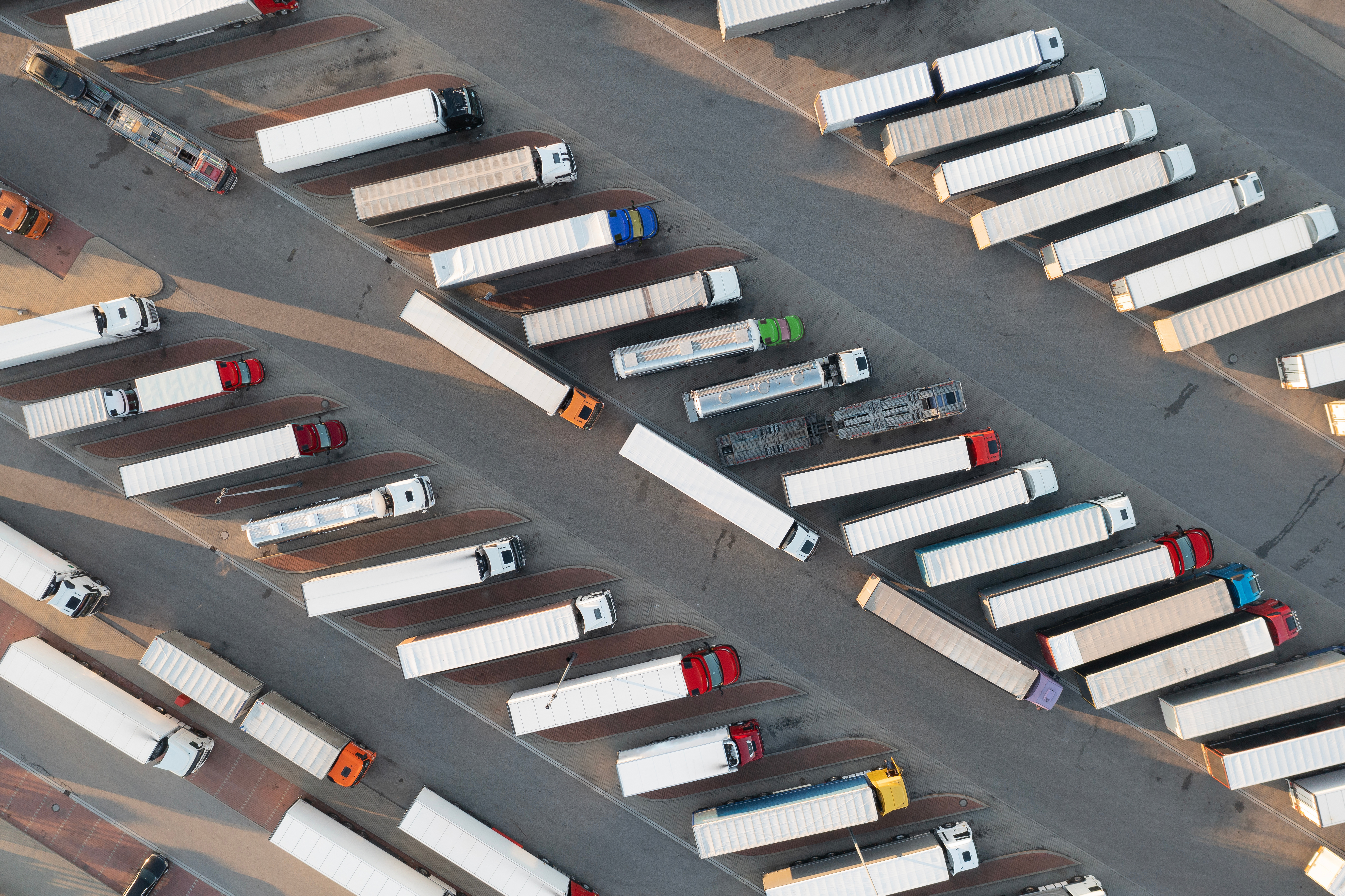 A huge number of trucks on a parking area