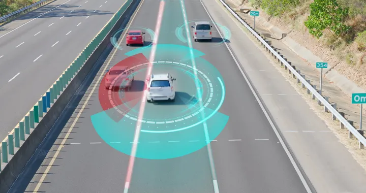 picture of an inteligent car analyzing the road with sensors